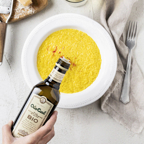 Olio Carli Extra Vergine di Oliva bio su Risotto allo zafferano
